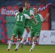 30 August 2002; John O'Flynn, centre, of Cork City, celebrates with team-mates Billy Woods and George O'Callaghan after scoring his side's first goal during the eircom League Premier Division match between Bohemians and Cork City at Dalymount Park in Dublin. Photo by David Maher/Sportsfile