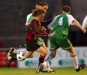 30 August 2002; Bobby Ryan of Bohemians in action against Gareth Cronin and Alan Carey of Cork City during the eircom League Premier Division match between Bohemians and Cork City at Dalymount Park in Dublin. Photo by David Maher/Sportsfile