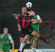 30 August 2002; Derek Coughlan of Bohemians in action against Billy Woods and Greg O'Halloran of Cork City during the eircom League Premier Division match between Bohemians and Cork City at Dalymount Park in Dublin. Photo by David Maher/Sportsfile