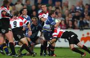 30 August 2002; Andy Dunne of Leinster is tackled by Ceri Sweeney of Pontypridd during the Celtic League Pool B match between Leinster and Pontypridd at Donnybrook Stadium in Dublin. Photo by Ray McManus/Sportsfile