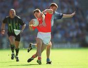 1 September 2002; Paddy McKeever of Armagh in action against Peadar Andrews of Dublin during the Bank of Ireland All-Ireland Senior Football Championship Semi-Final match between Armagh and Dublin at Croke Park in Dublin. Photo by Ray McManus/Sportsfile