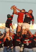 31 August 2002; Mick O'Driscoll of Munster wins possession in the lineout from Vernon Cooper, left, and Paul Claphamag of Llanelli during the Celtic League Pool A match between Llanelli and Munster at Stradey Park in Llanelli, Wales. Photo by Matt Browne/Sportsfile