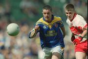 1 September 2002; Michael Hussey of Longford is tackled by Michael McGoldrick of Derry during the All-Ireland Minor Football Championship Semi-Final match between Longford and Derry at Croke Park in Dublin. Photo by Damien Eagers/Sportsfile
