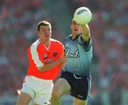 1 September 2002; Paddy Christie of Dublin is tackled by Ronan Clarke of Armagh during the Bank of Ireland All-Ireland Senior Football Championship Semi-Final match between Armagh and Dublin at Croke Park in Dublin. Photo by Ray McManus/Sportsfile