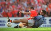 1 September 2002; Paddy McKeever of Armagh slides in to score his side's only goal despite the tackle from Paul Casey of Dublin during the Bank of Ireland All-Ireland Senior Football Championship Semi-Final match between Armagh and Dublin at Croke Park in Dublin. Photo by Damien Eagers/Sportsfile