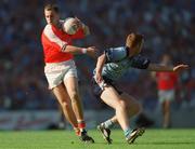 1 September 2002; Paddy McKeever of Armagh in action against Peadar Andrews of Dublin during the Bank of Ireland All-Ireland Senior Football Championship Semi-Final match between Armagh and Dublin at Croke Park in Dublin. Photo by Damien Eagers/Sportsfile