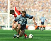 1 September 2002; Darren Homan of Dublin in action against Ronan Clarke of Armagh during the Bank of Ireland All-Ireland Senior Football Championship Semi-Final match between Armagh and Dublin at Croke Park in Dublin. Photo by Pat Murphy/Sportsfile