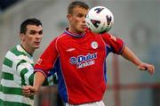 2 September 2002; Mark Roberts of Shelbourne in action against Pat Scully of Shamrock Rovers during the eircom League Premier Division match between Shamrock Rovers and Shelbourne at Tolka Park in Dublin. Photo by David Maher/Sportsfile