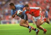 1 September 2002; Jason Sherlock of Dublin in action against Kieran McGeeney of Armagh during the Bank of Ireland All-Ireland Senior Football Championship Semi-Final match between Armagh and Dublin at Croke Park in Dublin. Photo by Brian Lawless/Sportsfile