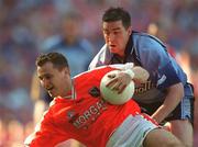 1 September 2002; Paddy McKeever of Armagh in action against John Magee of Dublin during the Bank of Ireland All-Ireland Senior Football Championship Semi-Final match between Armagh and Dublin at Croke Park in Dublin. Photo by Damien Eagers/Sportsfile