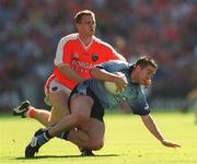 1 September 2002; John Magee of Dublin in action against John McEntee of Armagh during the Bank of Ireland All-Ireland Senior Football Championship Semi-Final match between Armagh and Dublin at Croke Park in Dublin. Photo by Ray McManus/Sportsfile