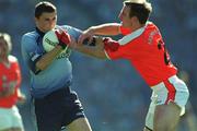 1 September 2002; Alan Brogan of Dublin is tackled by Enda McNulty of Armagh during the Bank of Ireland All-Ireland Senior Football Championship Semi-Final match between Armagh and Dublin at Croke Park in Dublin. Photo by Ray McManus/Sportsfile