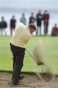 5 September 2002; Matt Donohue of Portumna Golf Club plays his third shot, from a bunker, to the 15th green during the Bulmers Junior Cup  at Galway Golf Club in Galway. Photo by Ray McManus/Sportsfile