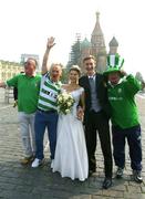 6 September 2002; Republic of Ireland supporters, from left, Tony Fitzpatrick, Dublin, Edwin Gregory, Wicklow, Gerry Matthews and Tony Shelvin, both from Dundalk, pictured in Red Square, Moscow, with a newly married couple prior to the UEFA European Championship 2004 Qualifier Group 10 match between Russia and Republic of Ireland. Photo by Brendan Moran/Sportsfile