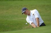 6 September 2002; Ronan Brannigan of Louth Golf Club plays out of a bunker at the 14th hole during the Bulmers Cup at Galway Golf Club in Galway. Photo by Ray McManus/Sportsfile