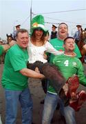 7 September 2002; Republic of Ireland supporters give a local girl a lift prior to the UEFA European Championship 2004 Qualifier Group 10 match between Russia and Republic of Ireland at the Lokomotiv Moscow Stadium in Moscow, Russia. Photo by David Maher/Sportsfile