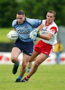 7 September 2002; Declan Lally of Dublin in action against Michael Anderson of Tyrone during the All-Ireland U21 Football Semi-Final match between Dublin and Tyrone at Breffni Park in Cavan. Photo by Damien Eagers/Sportsfile