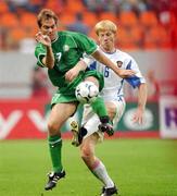 7 September 2002; Jason McAteer of Republic of Ireland in action against Igor Yanovski of Russia during the UEFA European Championship 2004 Qualifier Group 10 match between Russia and Republic of Ireland at the Lokomotiv Moscow Stadium in Moscow, Russia. Photo by David Maher/Sportsfile
