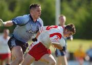 7 September 2002; Stephen McNally of Tyrone in action against Declan Lally of Dublin during the All-Ireland U21 Football Semi-Final match between Dublin and Tyrone at Breffni Park in Cavan. Photo by Damien Eagers/Sportsfile