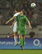 7 September 2002; Jason McAteer of Republic of Ireland in action against Alexander Kerzahkov of Russia during the UEFA European Championship 2004 Qualifier Group 10 match between Russia and Republic of Ireland at the Lokomotiv Moscow Stadium in Moscow, Russia. Photo by Brendan Moran/Sportsfile