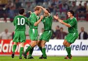 7 September 2002; Gary Doherty, second from left, of Republic of Ireland, celebrates with team-mates Robbie Keane, Kevin Kilbane and Ian Harte after scoring his side's first goal during the UEFA European Championship 2004 Qualifier Group 10 match between Russia and Republic of Ireland at the Lokomotiv Moscow Stadium in Moscow, Russia. Photo by David Maher/Sportsfile