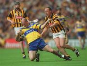 8 September 2002; Ollie Baker of Clare in action against Andy Comerford of Kilkenny during the Guinness All-Ireland Senior Hurling Championship Final match between Kilkenny and Clare at Croke Park in Dublin. Photo by Brian Lawless/Sportsfile