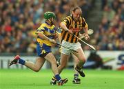 8 September 2002; Andy Comerford of Kilkenny is tackled by Alan Markhan of Clare during the Guinness All-Ireland Senior Hurling Championship Final match between Kilkenny and Clare at Croke Park in Dublin. Photo by Brian Lawless/Sportsfile