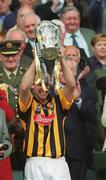 8 September 2002; Kilkenny's Andy Comerford lifts the Liam MacCarthy cup following the Guinness All-Ireland Senior Hurling Championship Final match between Kilkenny and Clare at Croke Park in Dublin. Photo by Aoife Rice/Sportsfile