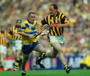 8 September 2002; Andy Comerford of Kilkenny is tackled by Colin Lynch of Clare during the Guinness All-Ireland Senior Hurling Championship Final match between Kilkenny and Clare at Croke Park in Dublin. Photo by Aoife Rice/Sportsfile