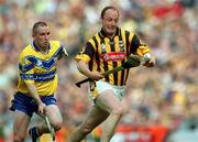 8 September 2002; Andy Comerford of Kilkenny in action against Colin Lynch of Clare during the Guinness All-Ireland Senior Hurling Championship Final match between Kilkenny and Clare at Croke Park in Dublin. Photo by Aoife Rice/Sportsfile