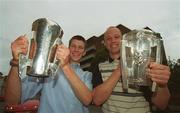 9 September 2002; Kilkenny minor captain Michael Rice, left, with the Irish Press cup, and Kilkenny senior captain Andy Comerford, with the Liam MacCarthy cup, during a photocall at the Burlington Hotel in Dublin, following their victories in the All-Ireland Finals. Photo by Brendan Moran/Sportsfile