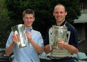 9 September 2002; Kilkenny minor captain Michael Rice, left, with the Irish Press cup, and Kilkenny senior captain Andy Comerford, with the Liam MacCarthy cup, during a photocall at the Burlington Hotel in Dublin, following their victories in the All-Ireland Finals. Photo by Brendan Moran/Sportsfile