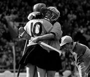 23 September 1990; Angela Downey, right, celebrates with Kilkenny team-mate Breda Holmes after scoring her side's first goal during the All-Ireland Senior Camogie Championship Final match between Kilkenny and Wexford at Croke Park in Dublin. Photo by Ray McManus/Sportsfile