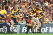 8 September 2002; Derek Lyng of Kilkenny in action against Brian Lohan of Clare during the Guinness All-Ireland Senior Hurling Championship Final match between Kilkenny and Clare at Croke Park in Dublin. Photo by Aoife Rice/Sportsfile