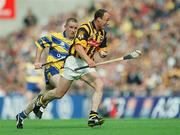 8 September 2002; Andy Comerford of Kilkenny in action against David Hoey of Clare during the Guinness All-Ireland Senior Hurling Championship Final match between Kilkenny and Clare at Croke Park in Dublin. Photo by Aoife Rice/Sportsfile