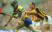 8 September 2002; Niall Gilligan of Clare in action against Andy Comerford of Kilkenny during the Guinness All-Ireland Senior Hurling Championship Final match between Kilkenny and Clare at Croke Park in Dublin. Photo by Aoife Rice/Sportsfile