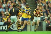 8 September 2002; Tony Carmody of Clare in action against Michael Kavanagh and goalkeeper James McGarry of Kilkenny during the Guinness All-Ireland Senior Hurling Championship Final match between Kilkenny and Clare at Croke Park in Dublin. Photo by Brian Lawless/Sportsfile