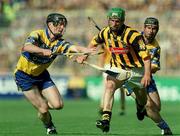 8 September 2002; Richard Mullally of Kilkenny in action against David Forde of Clare during the Guinness All-Ireland Senior Hurling Championship Final match between Kilkenny and Clare at Croke Park in Dublin. Photo by Damien Eagers/Sportsfile