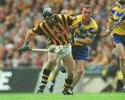 8 September 2002; DJ Carey of Kilkenny is tackled by Brian Quinn of Clare during the Guinness All-Ireland Senior Hurling Championship Final match between Kilkenny and Clare at Croke Park in Dublin. Photo by Aoife Rice/Sportsfile