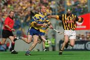 8 September 2002; Ollie Baker of Clare in action against Richard Mullally of Kilkenny during the Guinness All-Ireland Senior Hurling Championship Final match between Kilkenny and Clare at Croke Park in Dublin. Photo by Aoife Rice/Sportsfile