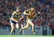 8 September 2002; Philip Larkin of Kilkenny in action against Niall Gilligan of Clare during the Guinness All-Ireland Senior Hurling Championship Final match between Kilkenny and Clare at Croke Park in Dublin. Photo by Damien Eagers/Sportsfile