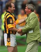8 September 2002; Kilkenny's DJ Carey is congratulated by a supporter following the Guinness All-Ireland Senior Hurling Championship Final match between Kilkenny and Clare at Croke Park in Dublin. Photo by Brian Lawless/Sportsfile