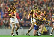 8 September 2002; Philip Larkin of Kilkenny in action against Colin Lynch of Clare. during the Guinness All-Ireland Senior Hurling Championship Final match between Kilkenny and Clare at Croke Park in Dublin. Photo by Damien Eagers/Sportsfile