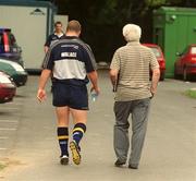 27 August 2002; Al Guy, Irish Sports Council, leads Paul Wallace for drug testing following Leinster rugby squad training at UCD in Dublin. Photo by Damien Eagers/Sportsfile