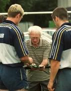 27 August 2002; Al Guy, Irish Sports Council, draws lots to decide which Leinster rugby players will go forward for drug testing, following Leinster rugby squad training at UCD in Dublin. Photo by Damien Eagers/Sportsfile