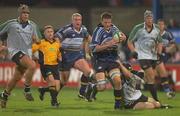 13 September 2002; Malcolm O'Kelly of Leinster is tackled by John O'Sullivan of Connacht during the Celtic League Pool B match between Leinster and Connacht at Donnybrook Stadium in Dublin. Photo by Damien Eagers/Sportsfile