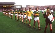 11 August 1985; Kerry captain Paidi O'Se leads goalkeeper Charlie Nelligan and the rest of the Kerry team in the pre-match parade prior to the All-Ireland Senior Football Championship semi-final match between Kerry and Monaghan at Croke Park in Dublin. Photo by Ray McManus/Sportsfile