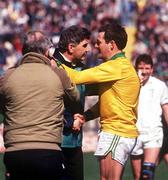 14 April 1991; Kerry goalkeeper Charlie Nelligan, right, congratulates Kildare manager Mick O'Dwyer after Kildare defeated Kerry in the Royal Liver Assurance National Football League match between Kildare and Kerry at Croke Park in Dublin. Photo by Ray McManus/Sportsfile