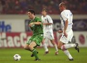 7 September 2002; Robbie Keane of Republic of Ireland, in action against Victor Onopko of Russia during the UEFA European Championship 2004 Qualifier Group 10 match between Russia and Republic of Ireland at the Lokomotiv Moscow Stadium in Moscow, Russia. Photo by Brendan Moran/Sportsfile