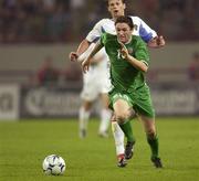 7 September 2002; Robbie Keane of Republic of Ireland in action against Andrey Karayka of Russia during the UEFA European Championship 2004 Qualifier Group 10 match between Russia and Republic of Ireland at the Lokomotiv Moscow Stadium in Moscow, Russia. Photo by Brendan Moran/Sportsfile